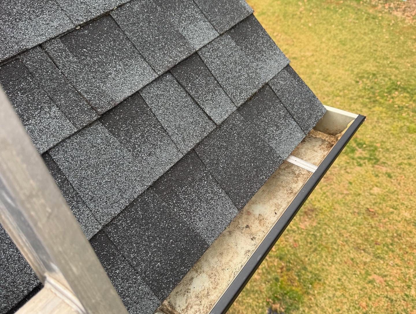 Roof washing removing black streaks and algae in Lincolnton NC
