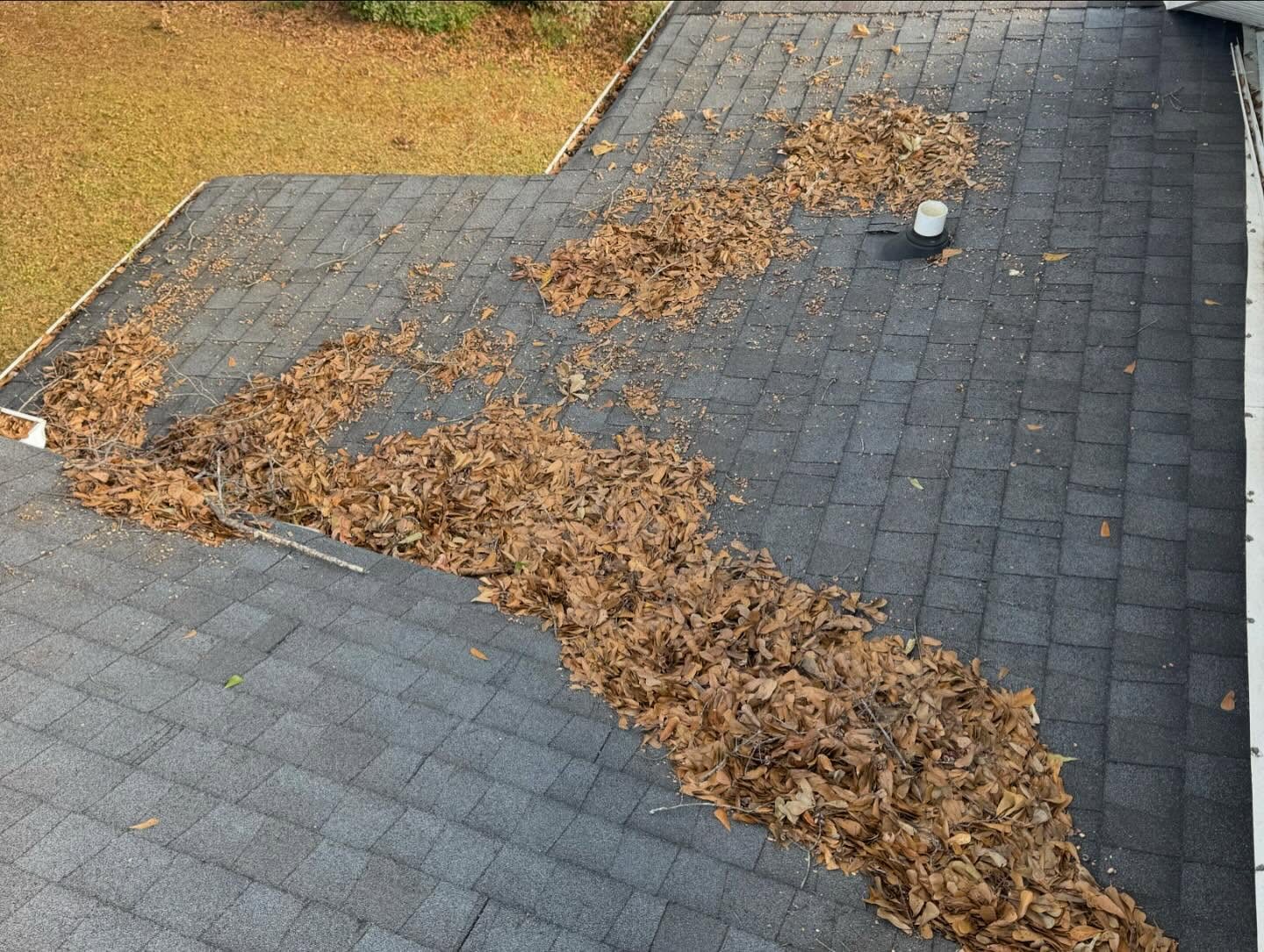 Clogged gutter before cleaning in Lincoln County NC