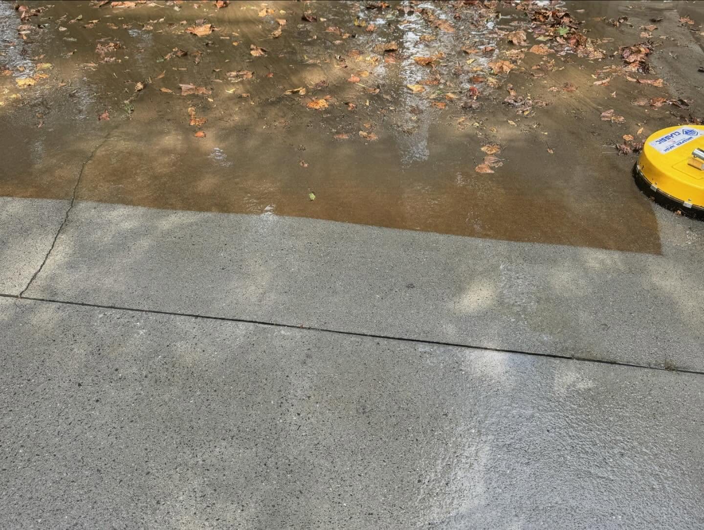 Concrete pad cleaned with a rotary surface cleaner in Lincolnton NC